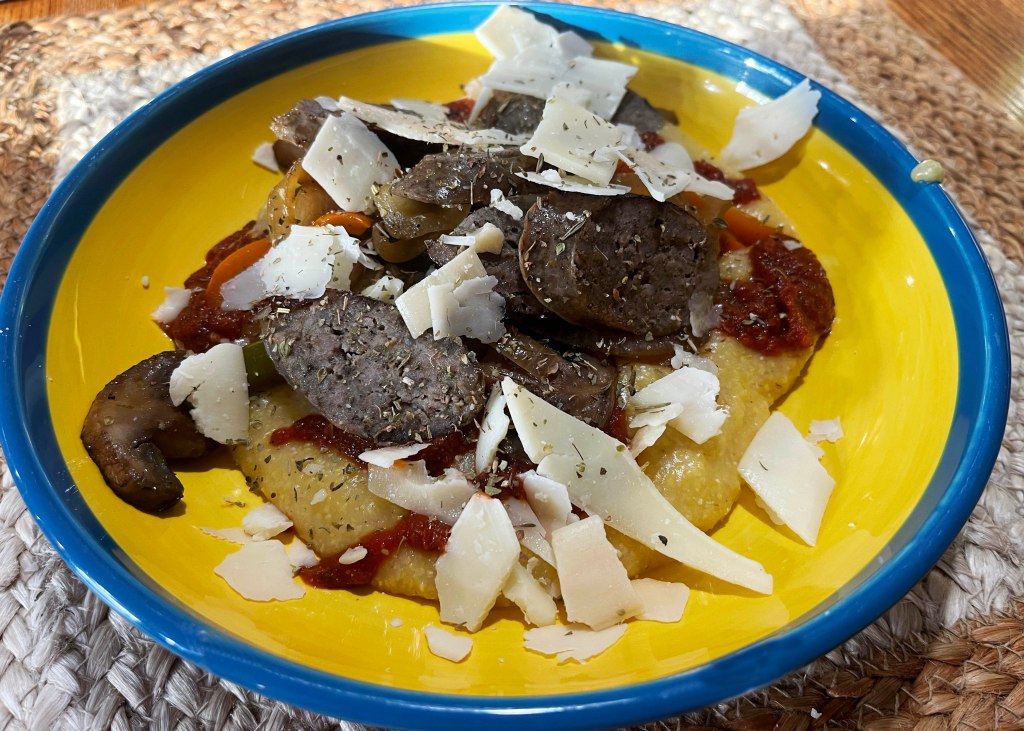 Sweet Italian sausage served on top of creamy polenta.