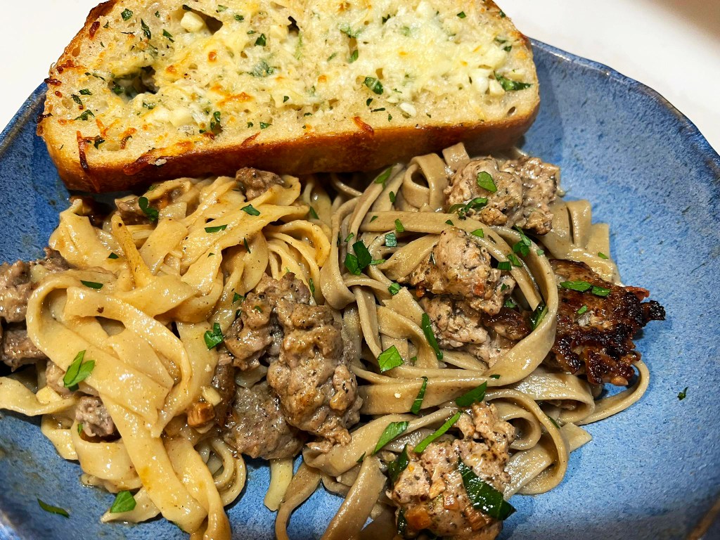Roasted Garlic & Sage sausage served in a pasta dish.