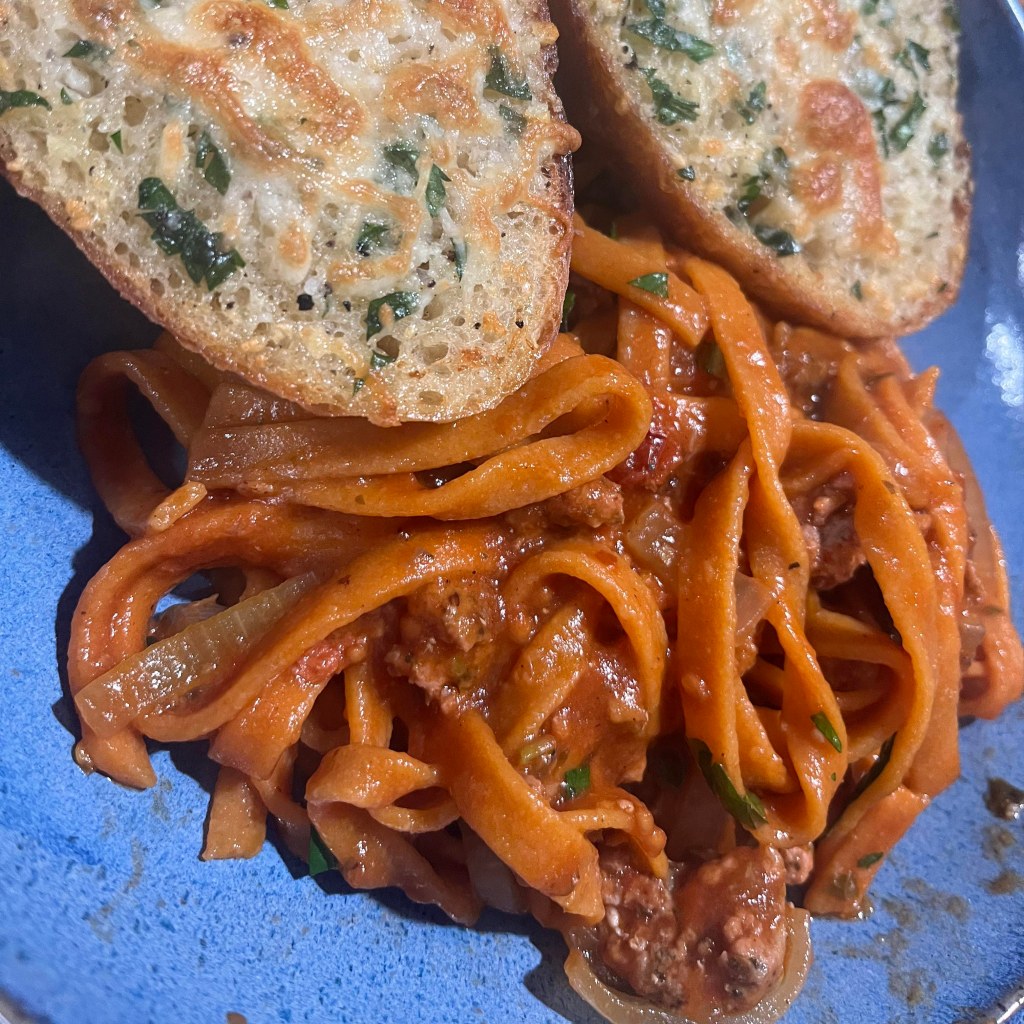 Sicilian sausage with sun-dried tomato pasta.